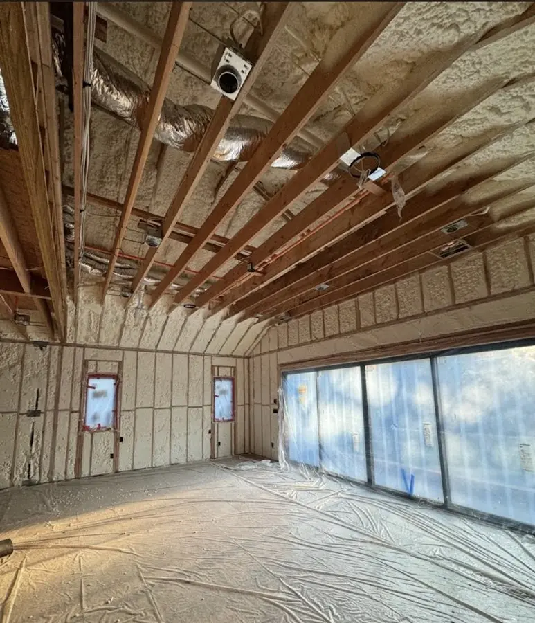 Interior walls and ceiling insulated with spray foam during new construction in Timberwood Park